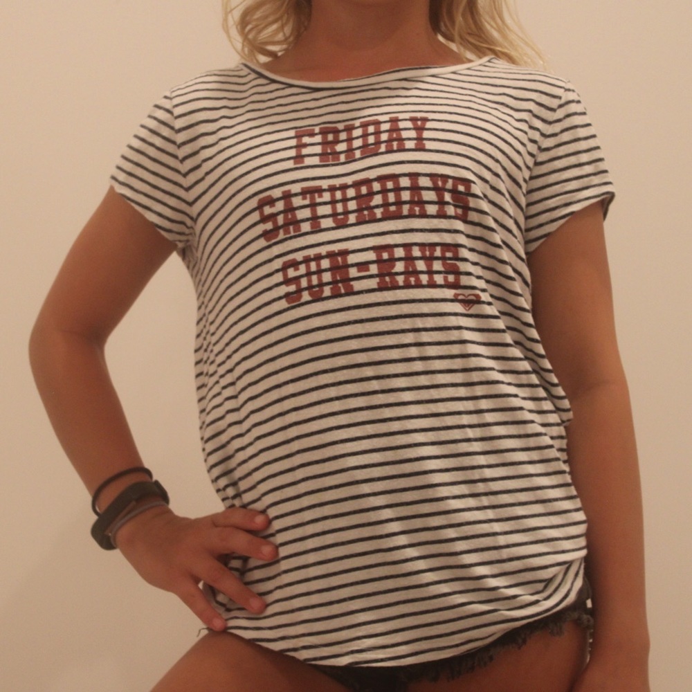 A Roxy top with strips and red lettering.